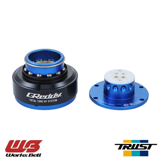 WORKS BELL RAPFIX II Quick Release Steering Wheel Hub - Blue / Black The all new "RAPFIX II" featuring a revised one-touch, light weight design. A Collaboration Between TRUST (GReddy) x WORKS BELL