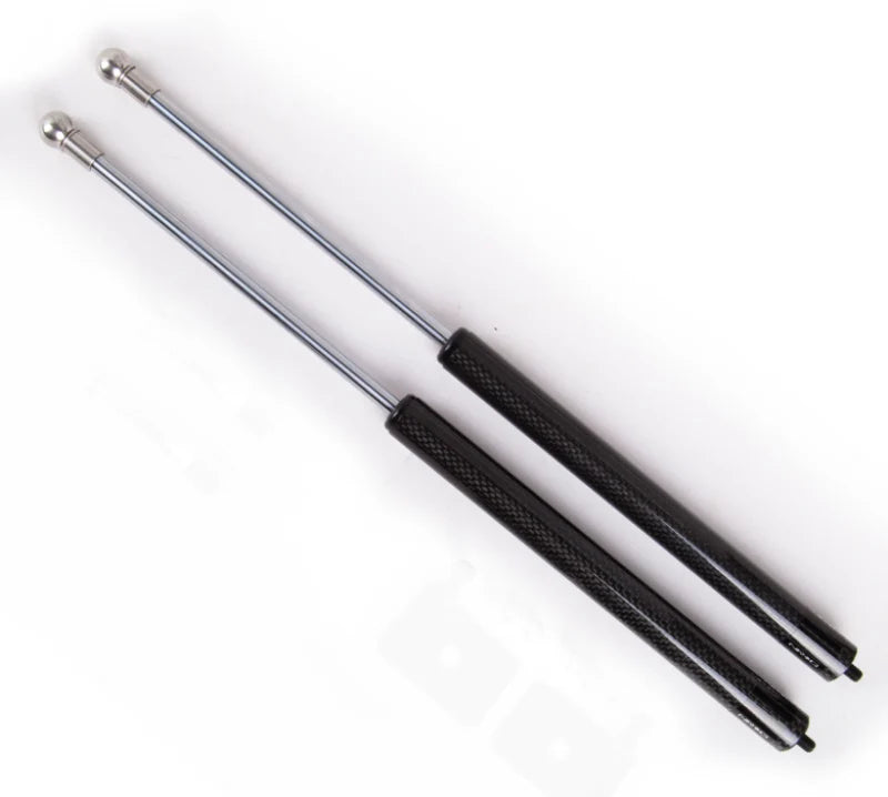 NRG Carbon Fiber Hood Damper Kit - 93-97 Mazda RX7