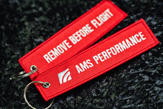 AMS Performance “Remove Before Flight” Keychain